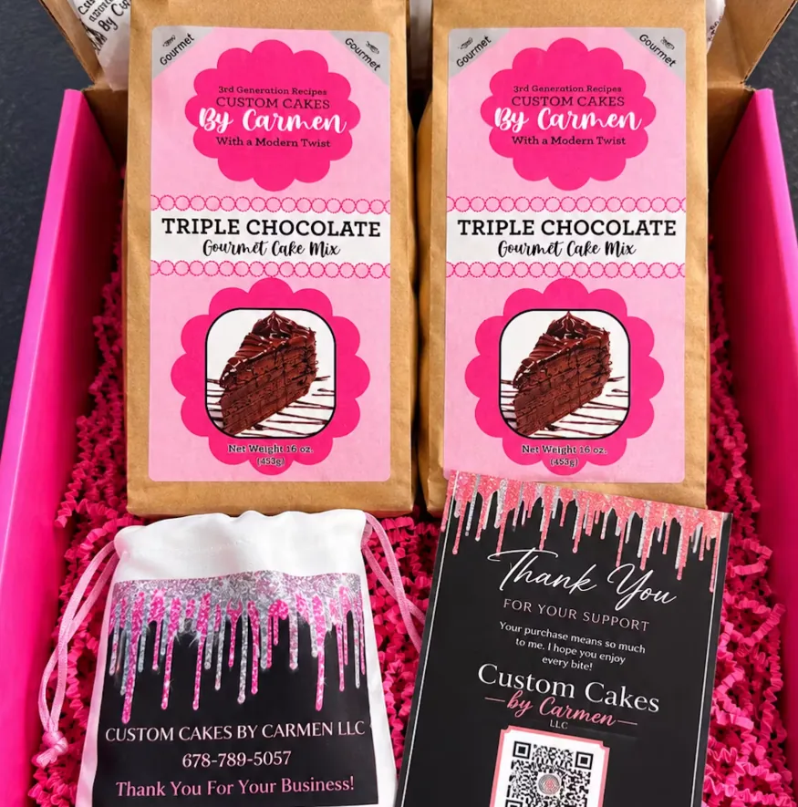 Custom Cakes By Carmen gift box with two Triple Chocolate Gourmet Cake Mix pouches, a favor bag and a thank-you card